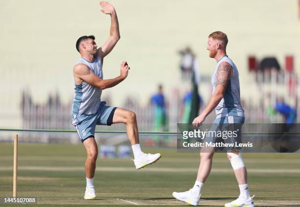 James Anderson of England pictured with Ben Stokes of England during a Nets Session ahead of the First Test match at Rawalpindi Cricket Stadium on...