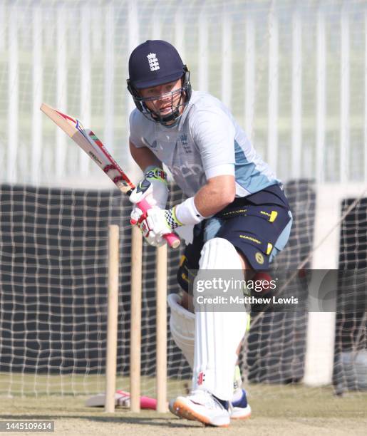 Ollie Pope of England pictured with James Anderson of England during a Nets Session ahead of the First Test match at Rawalpindi Cricket Stadium on...