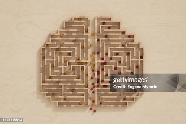 3d wooden maze shaped brain with colored spheres - sense organ stock pictures, royalty-free photos & images