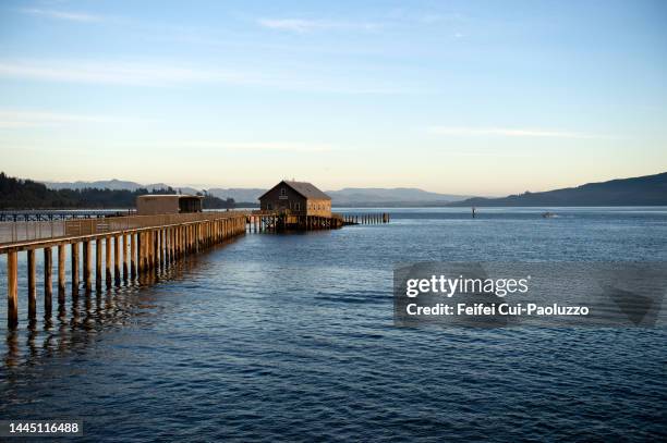 wooden jetty and boathouse at garibaldi - tillamook county fotografías e imágenes de stock