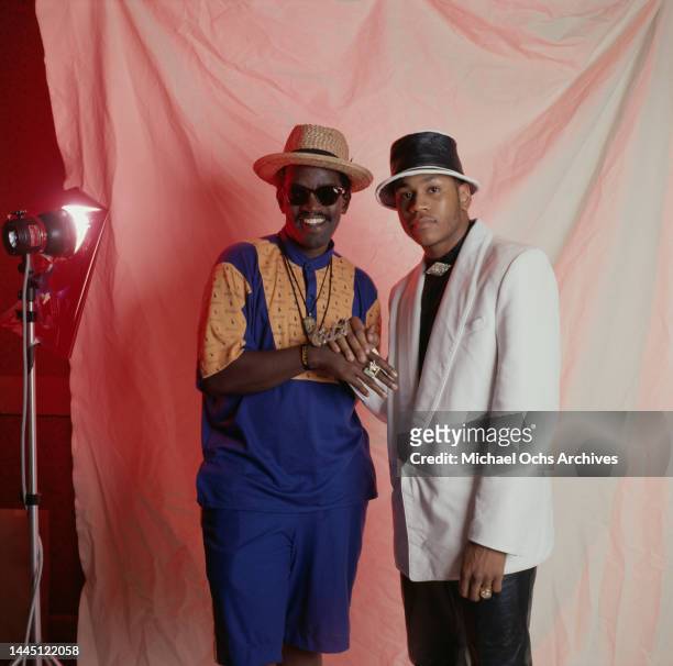 American rapper Fab 5 Freddy, wearing a yellow-and-blue Ralph Lauren 'Polo' outfit with an MTV ring, and American rapper LL Cool J, wearing a white...