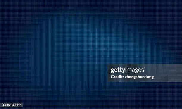 blue dots plane shaped under lights. - blue digital background stock-fotos und bilder