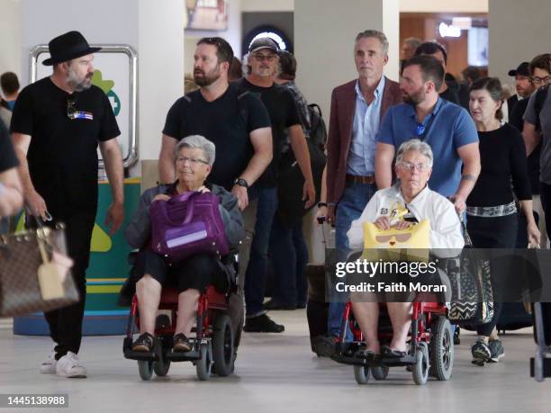 Jordan Peterson , his wife Tammy and entourage arrive at Perth Airport on November 28 in Perth, Australia.