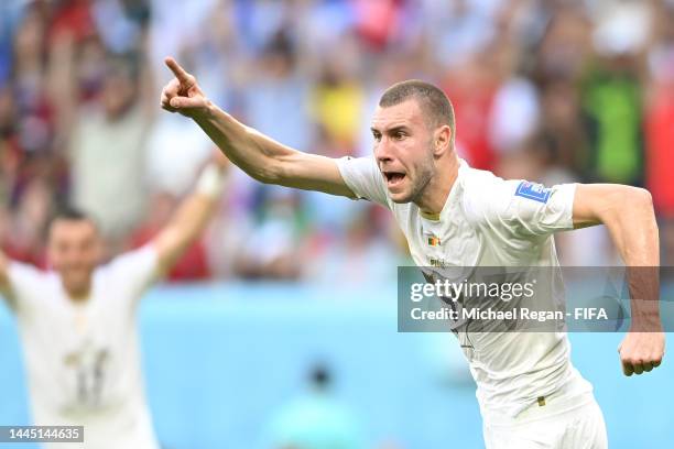 Strahinja Pavlovic of Serbia celebrates after scoring their team's first goal during the FIFA World Cup Qatar 2022 Group G match between Cameroon and...