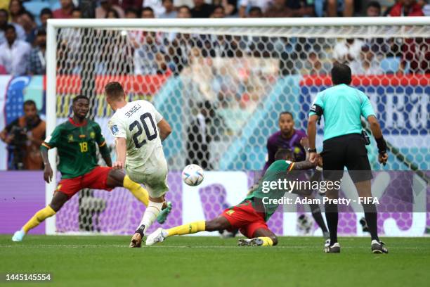 Sergej Milinkovic-Savic of Serbia scores their team's second goal during the FIFA World Cup Qatar 2022 Group G match between Cameroon and Serbia at...