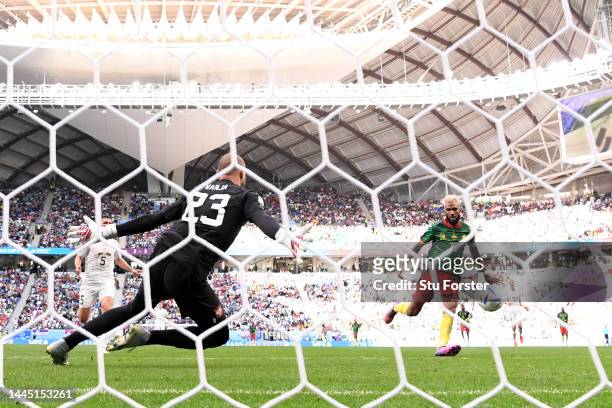 Eric Maxim Choupo-Moting of Cameroon scores their team's third goal past Vanja Milinkovic-Savic of Serbia during the FIFA World Cup Qatar 2022 Group...