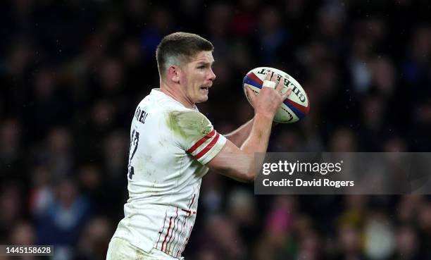 Owen Farrell of England holds onto the ball during the Autumn International match between England and South Africa at Twickenham Stadium on November...