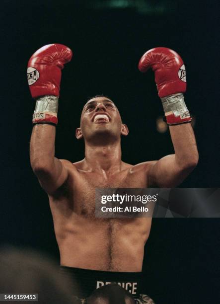 Featherweight Champion Prince Naseem Hamed from Great Britain celebrates his fourth round knockout of Augie Sanchez of the United States to retain...