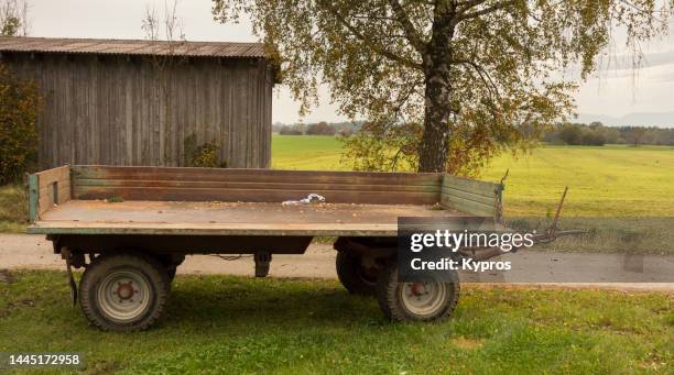 steel trailer  agricultural vehicle - trailer stock-fotos und bilder