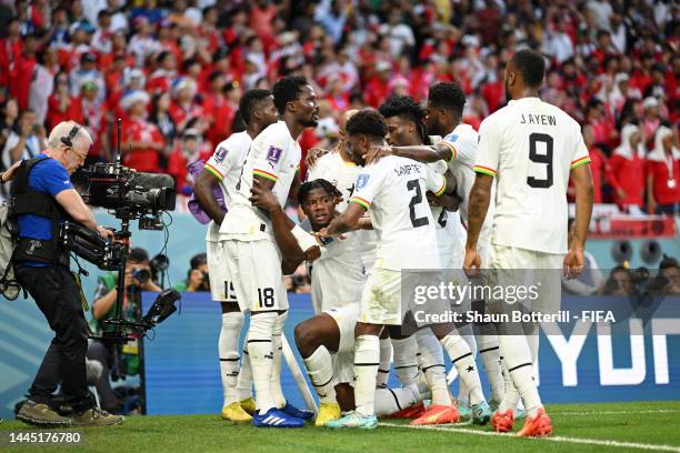 Mohammed Salisu of Ghana celebrates with teammates after scoring their team's first goal during the FIFA World Cup Qatar 2022 Group H match between...