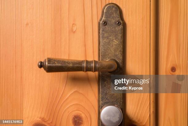 wooden door with metal handle - doorknob stock pictures, royalty-free photos & images
