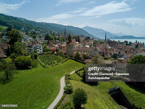 panorama of zug, the beautiful town close to zurich - fairytale village stock pictures, royalty-free photos & images