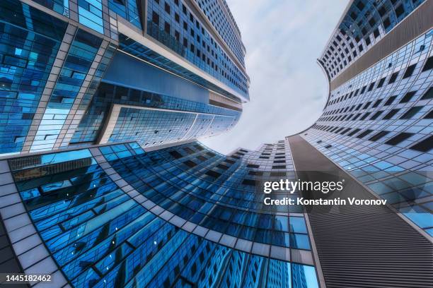 skyscraper view from below. exquisite modern business architecture. - georgia steel fotografías e imágenes de stock