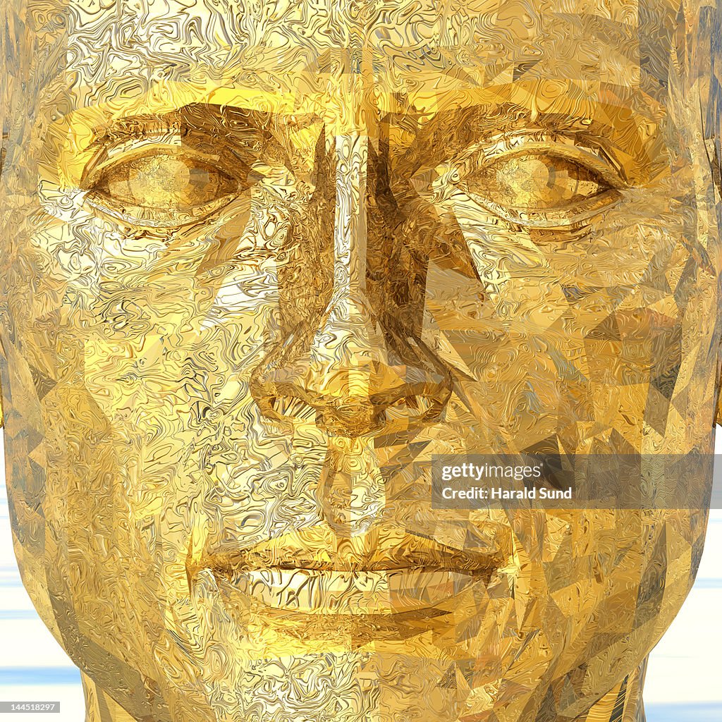 Golden, metallic textured male human face