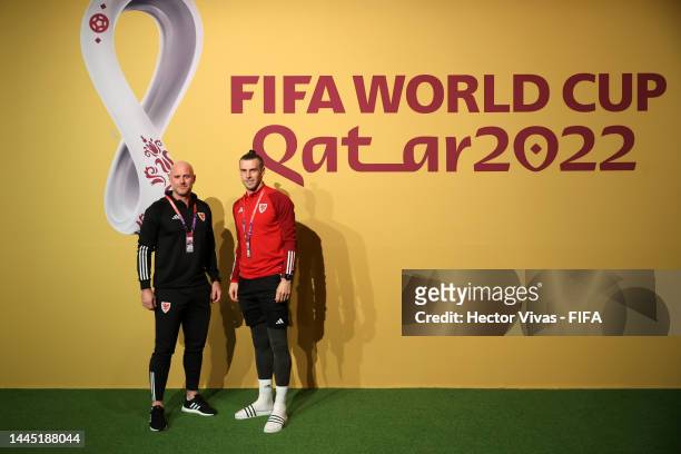 Rob Page, Head Coach of Wales, and Gareth Bale of Wales pose for a photo during the Wales Press Conference at the Main Media Center on November 28,...