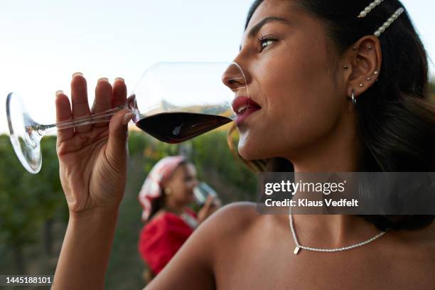 young bride drinking red wine - choker necklace stock pictures, royalty-free photos & images