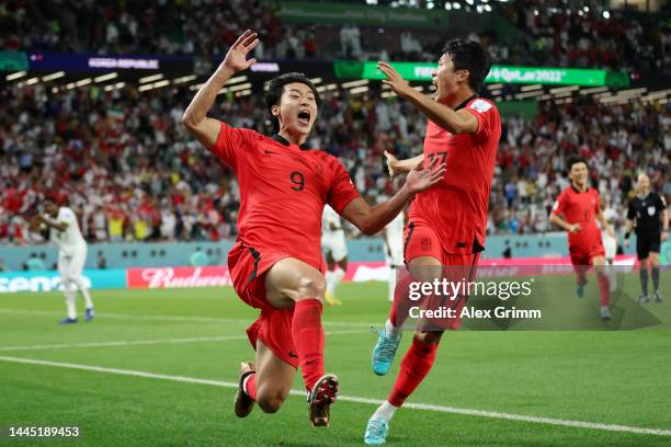 Guesung Cho of Korea Republic celebrates with Sangho Na after scoring their team's second goal during the FIFA World Cup Qatar 2022 Group H match...