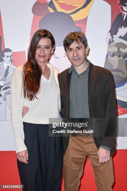 Claudia Pandolfi and Luigi Lo Cascio attends the photocall before the press conference she wears clothing and jewels designed by Federica Tosi at the...