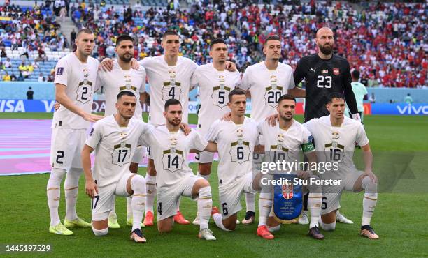 The Serbia team line up for the team picture befo the FIFA World Cup Qatar 2022 Group G match between Cameroon and Serbia at Al Janoub Stadium on...