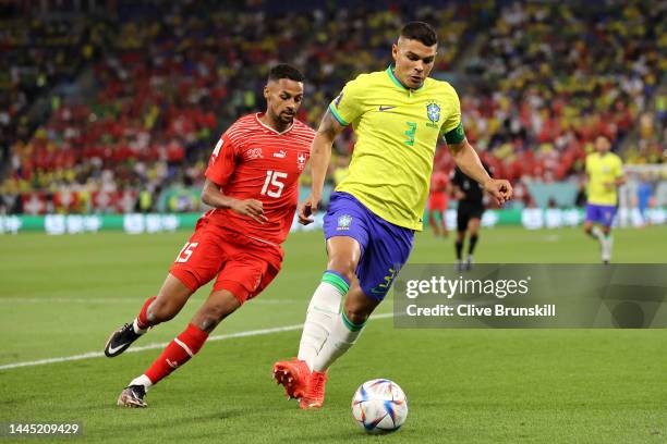 Thiago Silva of Brazil controls the ball against Djibril Sow of Switzerland during the FIFA World Cup Qatar 2022 Group G match between Brazil and...