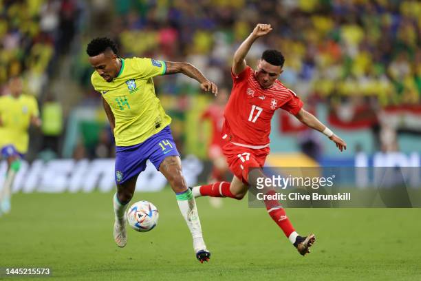 Eder Militao of Brazil and Ruben Vargas of Switzerland compete for the ball during the FIFA World Cup Qatar 2022 Group G match between Brazil and...