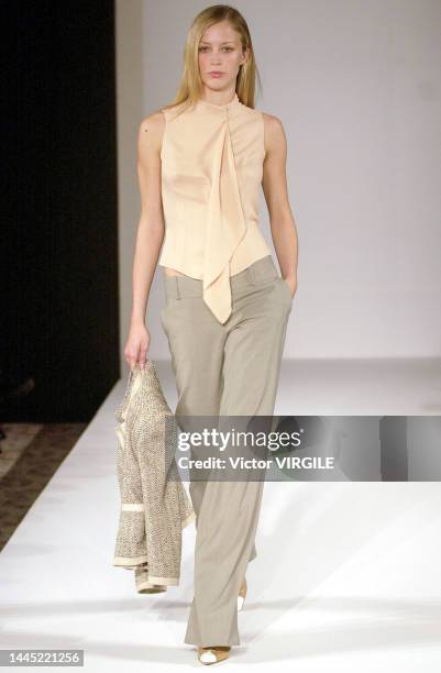 Raquel Zimmermann walks the runway during the Douglas Hannant Ready to Wear Spring/Summer 2002 fashion show as part of the New York Fashion Week on...