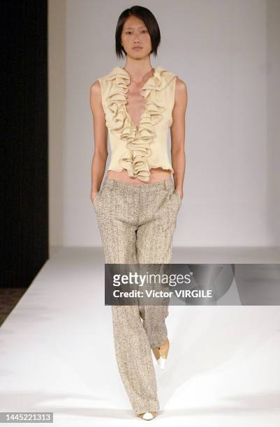 Model walks the runway during the Douglas Hannant Ready to Wear Spring/Summer 2002 fashion show as part of the New York Fashion Week on September 10,...