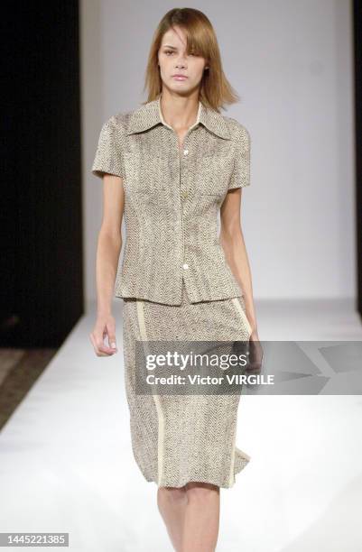 Model walks the runway during the Douglas Hannant Ready to Wear Spring/Summer 2002 fashion show as part of the New York Fashion Week on September 10,...