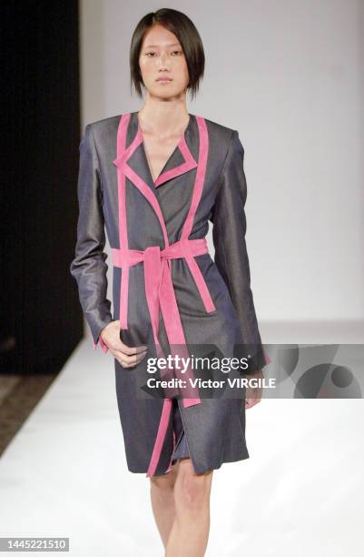 Model walks the runway during the Douglas Hannant Ready to Wear Spring/Summer 2002 fashion show as part of the New York Fashion Week on September 10,...