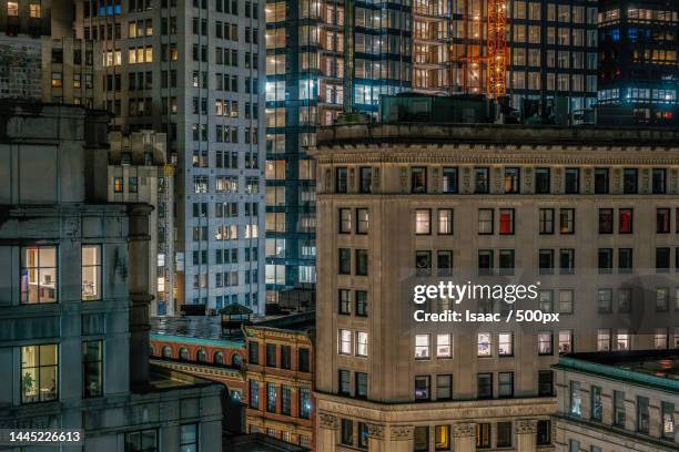 low angle view of buildings in city,boston,massachusetts,united states,usa - boston financial district stock pictures, royalty-free photos & images