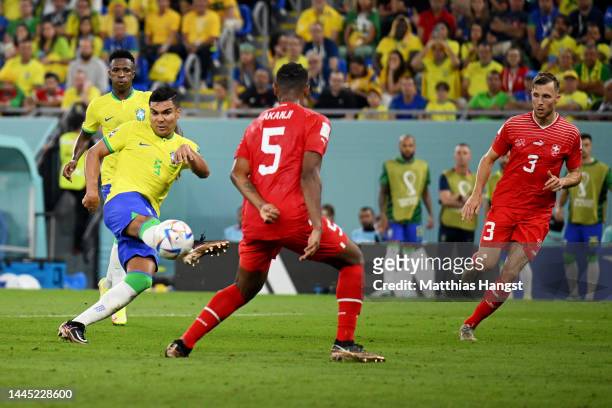 Casemiro of Brazil battles for possession with Renato Steffen of Switzerland during the FIFA World Cup Qatar 2022 Group G match between Brazil and...