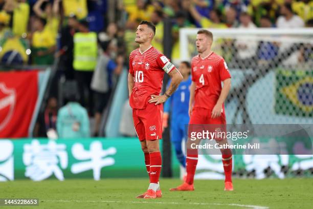 Granit Xhaka of Switzerland reacts after conceding their first goal to Casemiro of Brazil during the FIFA World Cup Qatar 2022 Group G match between...
