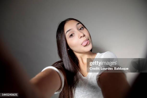 young woman making a selfie - spain madrid madrid girls stock pictures, royalty-free photos & images
