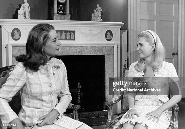 Tricia Nixon speaks with Barbara Walters before an interview April 28, 1972 at the White House.