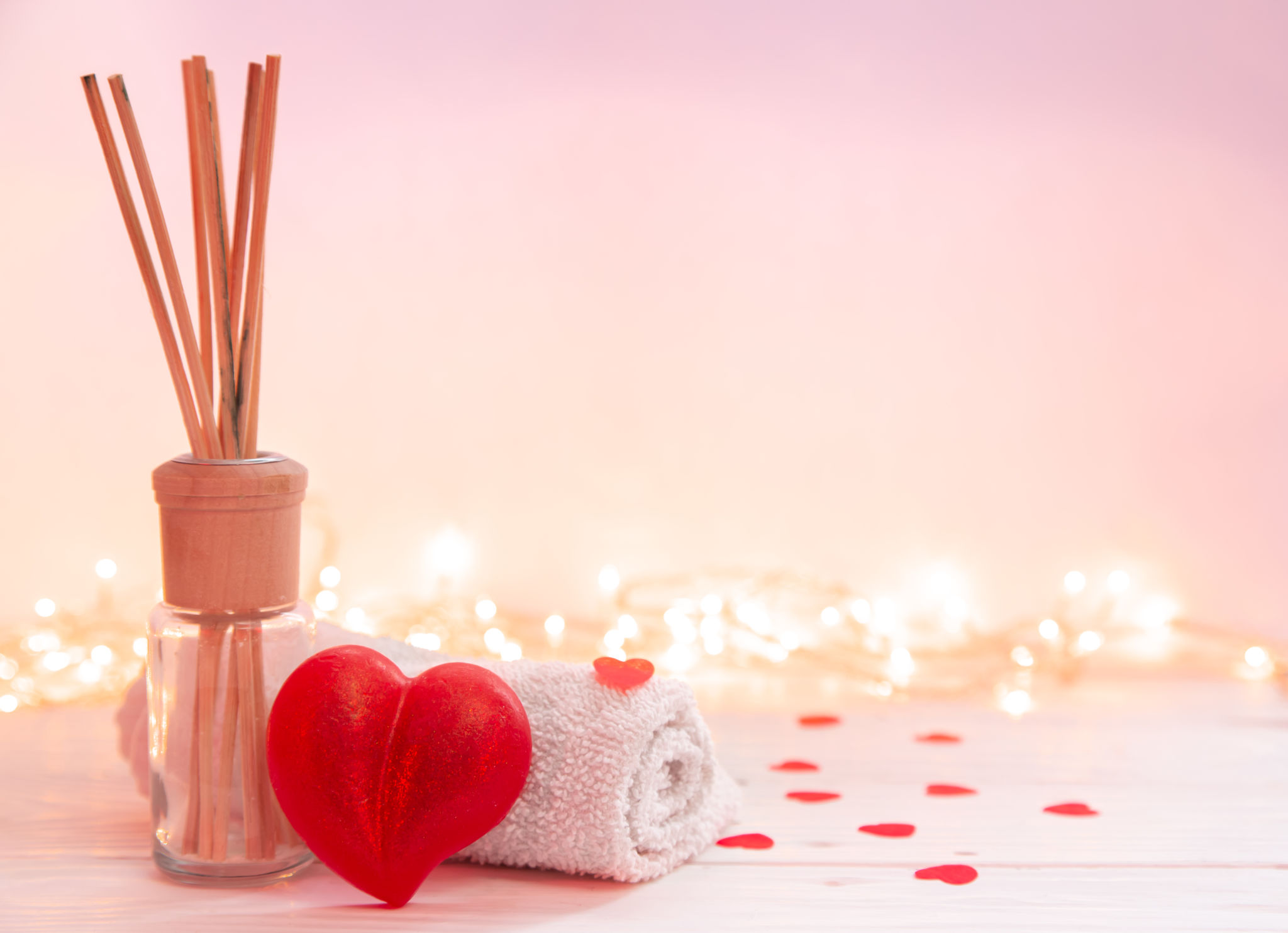 Spa composition with incense sticks, towel and heart shaped soap. Spa composition with incense sticks, towel and heart shaped soap.