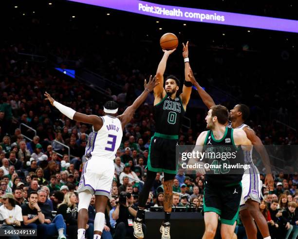 Jayson Tatum of the Boston Celtics shoots during the third quarter of the game against the Sacramento Kings at TD Garden on November 25, 2022 in...