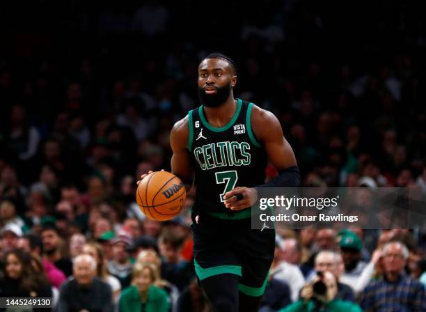 Jaylen Brown of the Boston Celtics brings the ball up court during the fourth quarter of the game against the Sacramento Kings at TD Garden on...