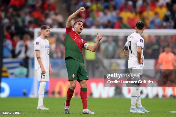 Cristiano Ronaldo of Portugal celebrates their team's first goal by Bruno Fernandes during the FIFA World Cup Qatar 2022 Group H match between...