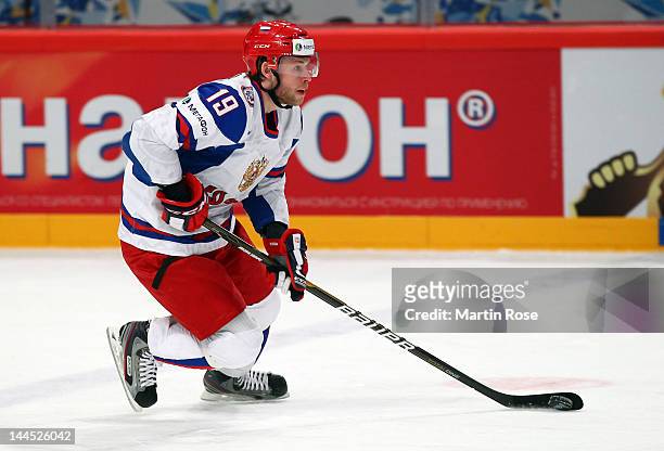 Denis Kokarev of Russia controls the puck against Italy during the IIHF World Championship group S match between Italy and Russia at Ericsson Globe...