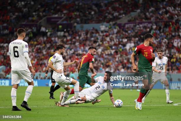 Bruno Fernandes of Portugal controls the ball against Jose Maria Gimenez of Uruguay during the FIFA World Cup Qatar 2022 Group H match between...