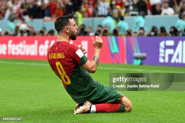 Bruno Fernandes of Portugal celebrates after scoring their team's second goal off a penalty during the FIFA World Cup Qatar 2022 Group H match...