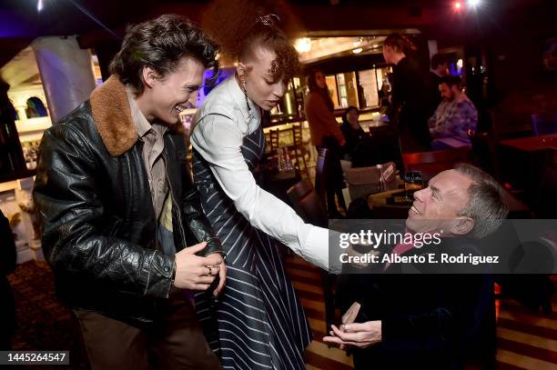 Dempsey Bryk, Erin Kellyman, and Warwick Davis attend a special influencer screening of Willow at The Magic Castle in Hollywood, California on...