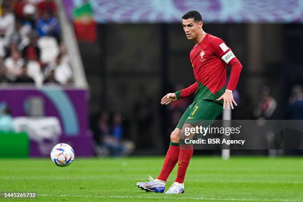 Cristiano Ronaldo of Portugal passes the ball during the Group H - FIFA World Cup Qatar 2022 match between Portugal and Uruguay at the Lusail Stadium...