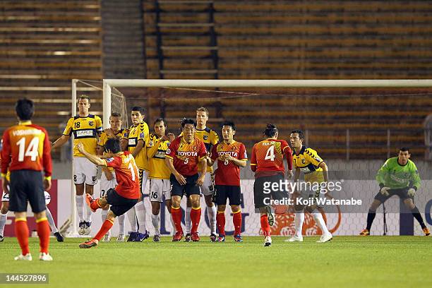 Keiji Tamada#11 of Nagoya Grampus scores the first Free kick on goal during the AFC Asian Champions League Group G match between Nagoya Grampus and...
