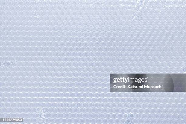 bubble pack background - luftpolsterfolie stock-fotos und bilder