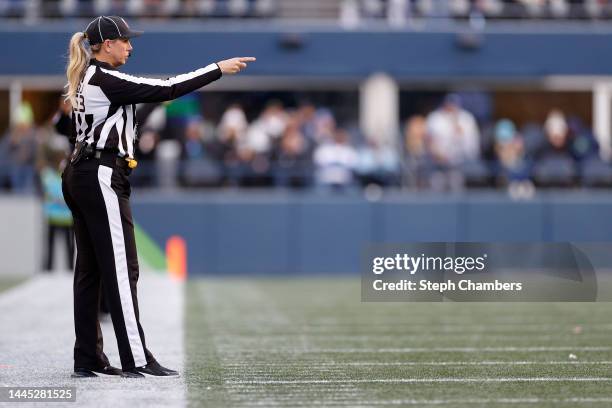 Down judge Sarah Thomas looks on during the second half between the Seattle Seahawks and the Las Vegas Raiders at Lumen Field on November 27, 2022 in...