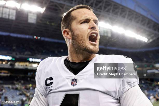 Derek Carr of the Las Vegas Raiders celebrates after beating the Seattle Seahawks 40-34 in overtime at Lumen Field on November 27, 2022 in Seattle,...