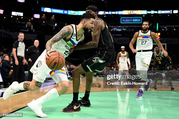 Austin Rivers Wolves Austin Rivers of the Minnesota Timberwolves dribbles around Jalen ...
