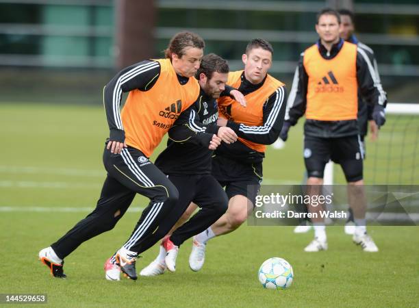 David Luiz, Juan Mata, Gary Cahill of Chelsea during a training session at the Cobham training ground on May 15, 2012 in Cobham, England.