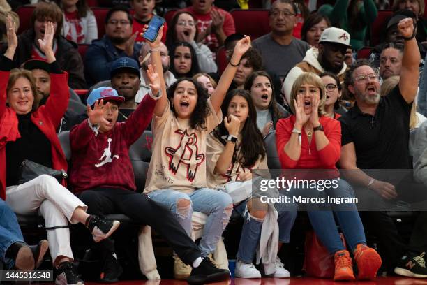 Fans cheer during the game between the Atlanta Hawks and Houston Rockets at Toyota Center on November 25, 2022 in Houston, Texas.